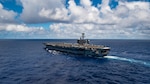 Nimitz-class aircraft carrier USS Carl Vinson (CVN 70) transits the Pacific Ocean, June 22, 2021. Vinson recently completed a Planned Incremental Availability four days ahead of schedule at Puget Sound Naval Shipyard & Intermediate Maintenance Facility, in Bremerton, Washington. (U.S. Navy photo by Mass Communication Specialist 3rd Class Haydn N. Smith)