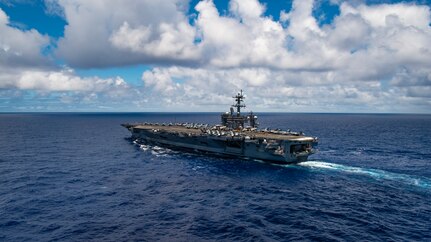 Nimitz-class aircraft carrier USS Carl Vinson (CVN 70) transits the Pacific Ocean, June 22, 2021. Vinson recently completed a Planned Incremental Availability four days ahead of schedule at Puget Sound Naval Shipyard & Intermediate Maintenance Facility, in Bremerton, Washington. (U.S. Navy photo by Mass Communication Specialist 3rd Class Haydn N. Smith)