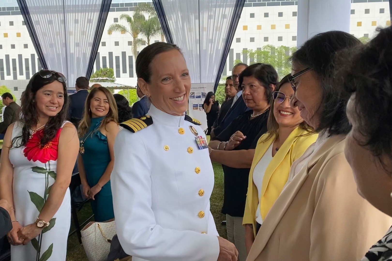 Capt. Franca Jones, commanding officer, Naval Medical Research Unit (NAMRU)-6, greets attendees at the command’s 40th anniversary celebration at the U.S. Embassy Campus. NAMRU-6 hosted several visitors and guests from the U.S. and Peru at the event, to include U.S. Ambassador to Peru Lisa Kenna, Rear Adm. Jorge Enrique Andaluz Echevarría, Surgeon General of the Peruvian Navy, Rear Adm. Guido F. Valdes, commander, Naval Medical Forces Pacific and Capt. William Denniston, commander, Naval Medical Research Center. Visitors provided remarks celebrating the history of the command and its ongoing mission. NAMRU-6, part of the Naval Medical Research & Development enterprise, supports Global Health Engagement through surveillance of a wide range of infectious diseases of military or public health significance, including dengue fever, malaria, diarrheal diseases, and sexually transmitted infections.