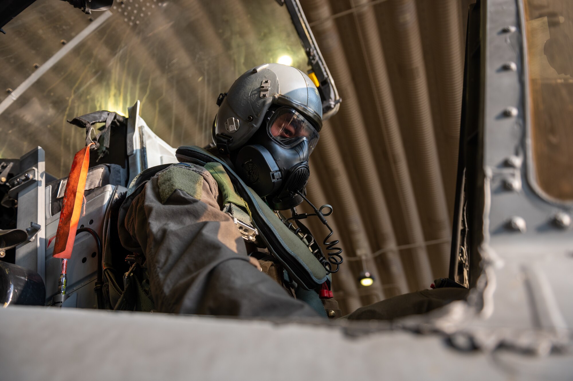 U.S. Air Force 1st Lt. Michael Davey, 25th Fighter Squadron pilot, wears specialized personal protective equipment in an A-10C Thunderbolt II while participating in a next generation aircrew protection (NGAP) evaluation at Osan Air Base, Republic of Korea, Jan. 18, 2023.