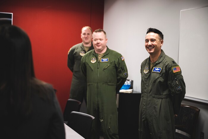 Lt. Col. Dustin Johnson, 89th Airlift Squadron commander, and his crew speak with Undersecretary of the Air Force Gina Ortiz Jones on Jan. 9 at Wright-Patterson Air Force Base, Ohio.