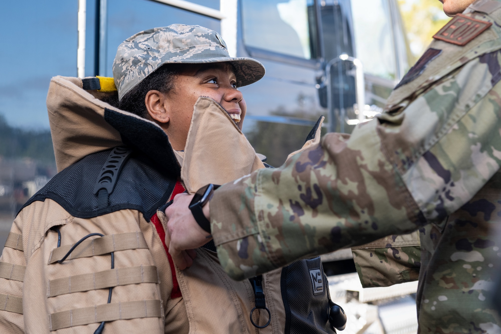 A Thomasville High School Junior ROTC student tries on an explosive ordnance disposal protective bomb suit.