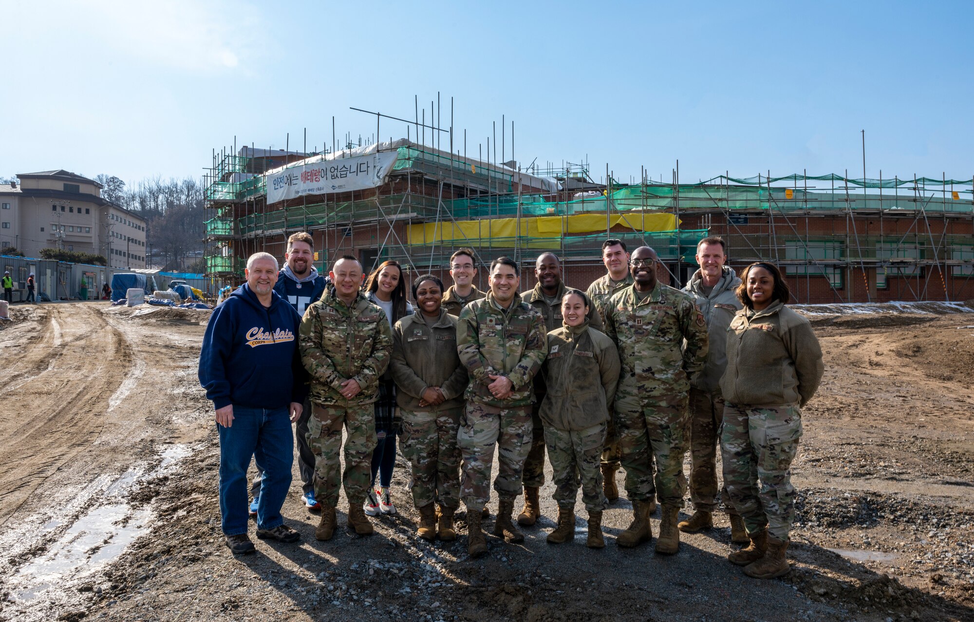 U.S. Air Force 51st Fighter Wing Chaplains and Religious Ministry professionals pose for a photo at the construction site of the new chapel, Osan Air Base, Republic of Korea, Jan. 17, 2023