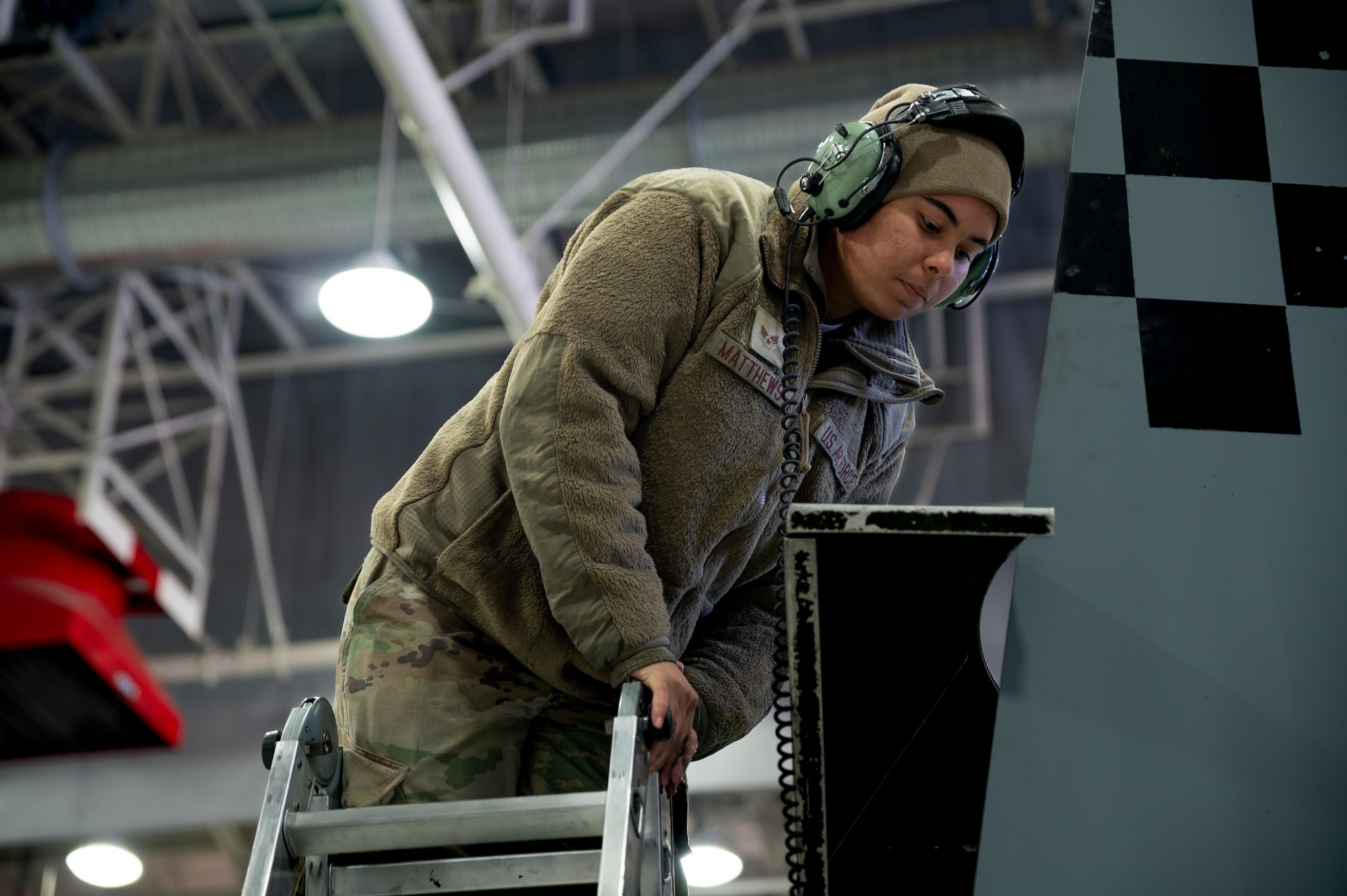 U.S. Air Force Senior Airman Zewdi Matthews, 25th Fighter Generation Squadron (FGS) crew chief, inspects the tail of an A-10C Thunderbolt II during a phase inspection at Osan Air Base, Republic of Korea, Jan. 12, 2023.