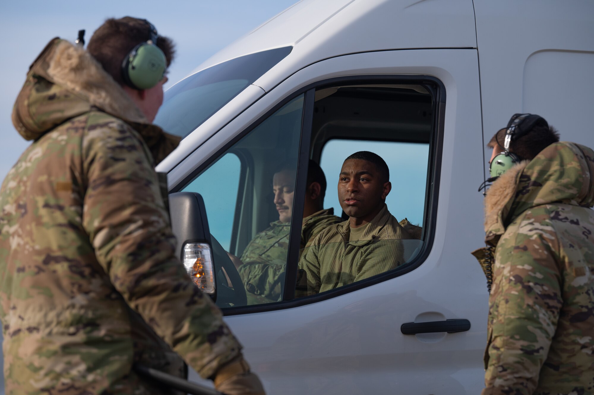 U.S. Air Force Staff Sgt. Marc McLawyer, 100th Aircraft Maintenance Squadron hydraulic technician craftsman, explains the next steps of preparing a KC-135 Stratotanker aircraft for takeoff on the flightline, Jan. 18, 2023, at Royal Air Force Mildenhall, England.