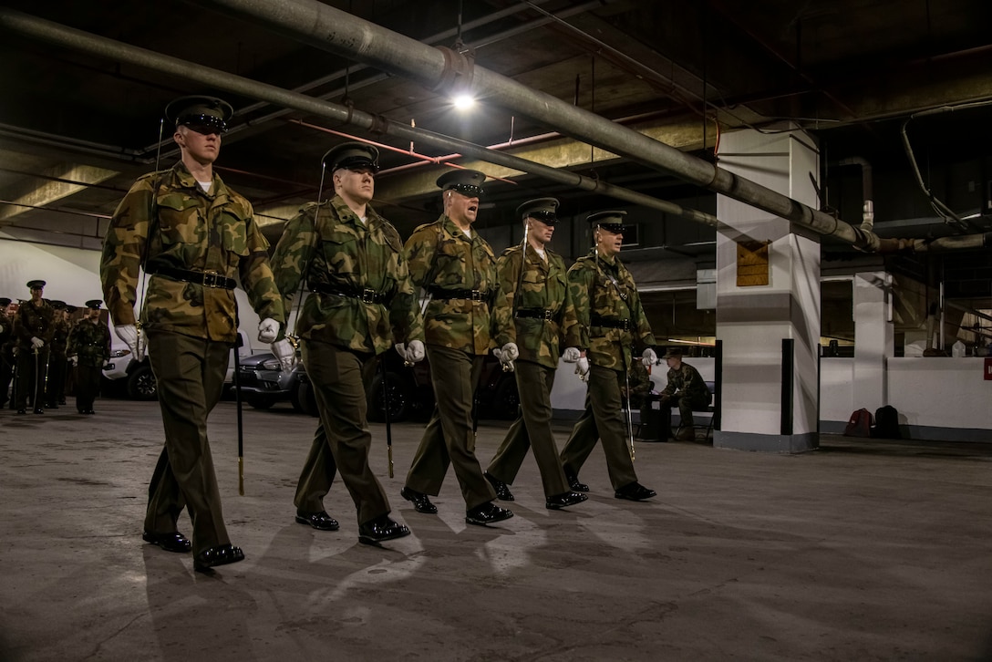 Marines with Marine Barracks Washington practice executing “eyes right.” during Ceremonial Drill School at Marine Barracks Washington, D.C., Jan 18, 2023. During the 3-week course, Marines will spend countless hours perfecting drill movements to ensure that every Tuesday Sunset Parade and Friday Evening Parade is flawless. (U.S. Marine Corps photo by Cpl. Mark A. Morales)