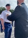 Lt. Col. Brian Kilgore, 412th Theater Engineer Command Deputy G4/Logistics Officer, placed the infantry cord on his son, Pfc. Landen Kilgore, following his graduation from Basic Combat and Advanced Individual Training, recently. (Courtesy photo)