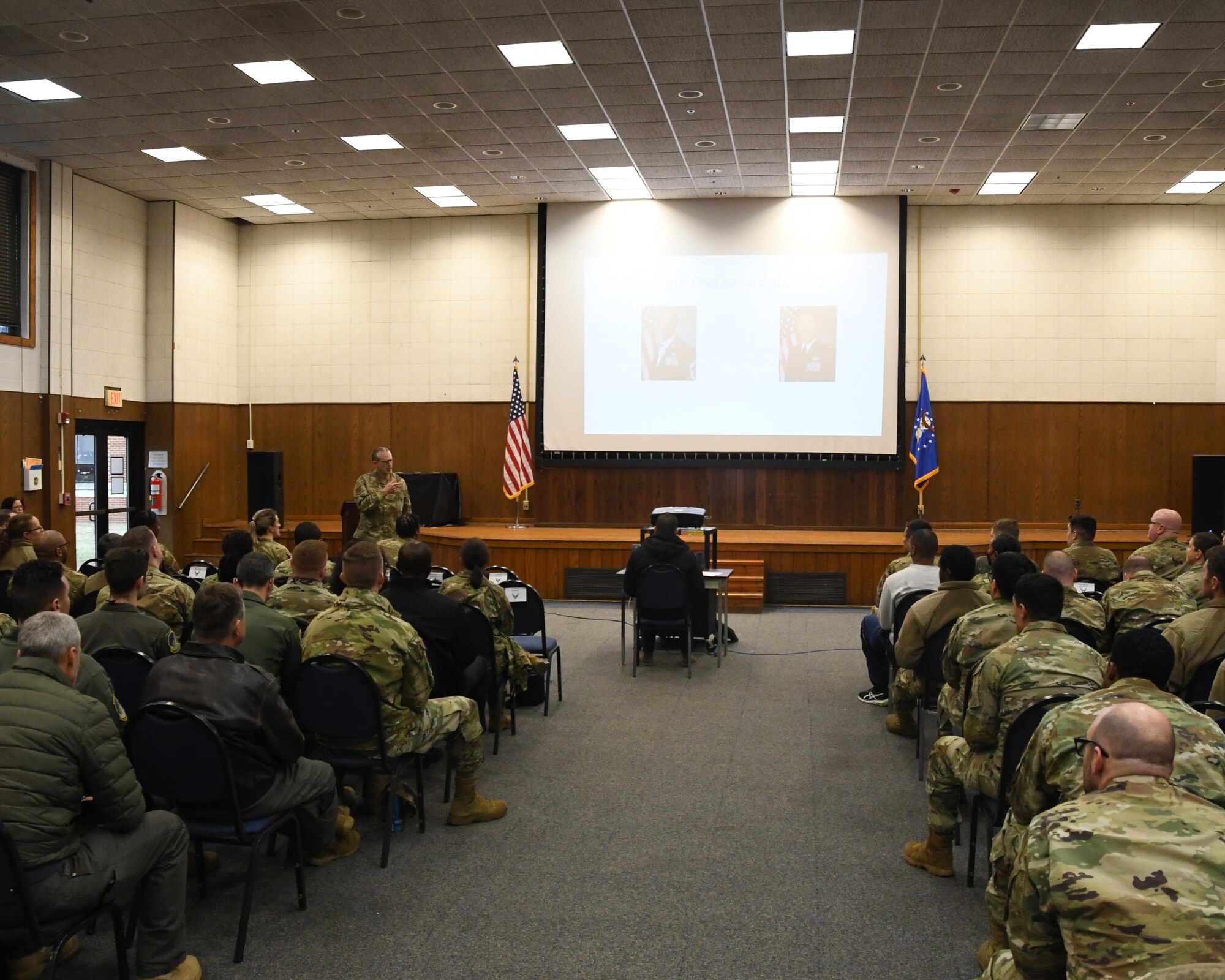 Col. Greg Buchanan, 459th Air Refueling Wing Commander, speaks at the 459th Air Refueling Wing All Call for full-time staff on Jan. 19, 2023. The All Call was stood up to provide information relevant to its civilians, Air Reserve Technicians, and Active Guard Reserve members. Also, members were recognized for hitting milestones in their decades of federal service. Members awarded recognition are Senior Master Sgt Rodney Price for 30 years of federal service, Tech Sgt Kalani Herrera, Senior Master Sgt Sara Sims and Col Matthew Ihlenfeld for 20 years of federal service, and Master Sgt John Johnson for 10 years of federal service.