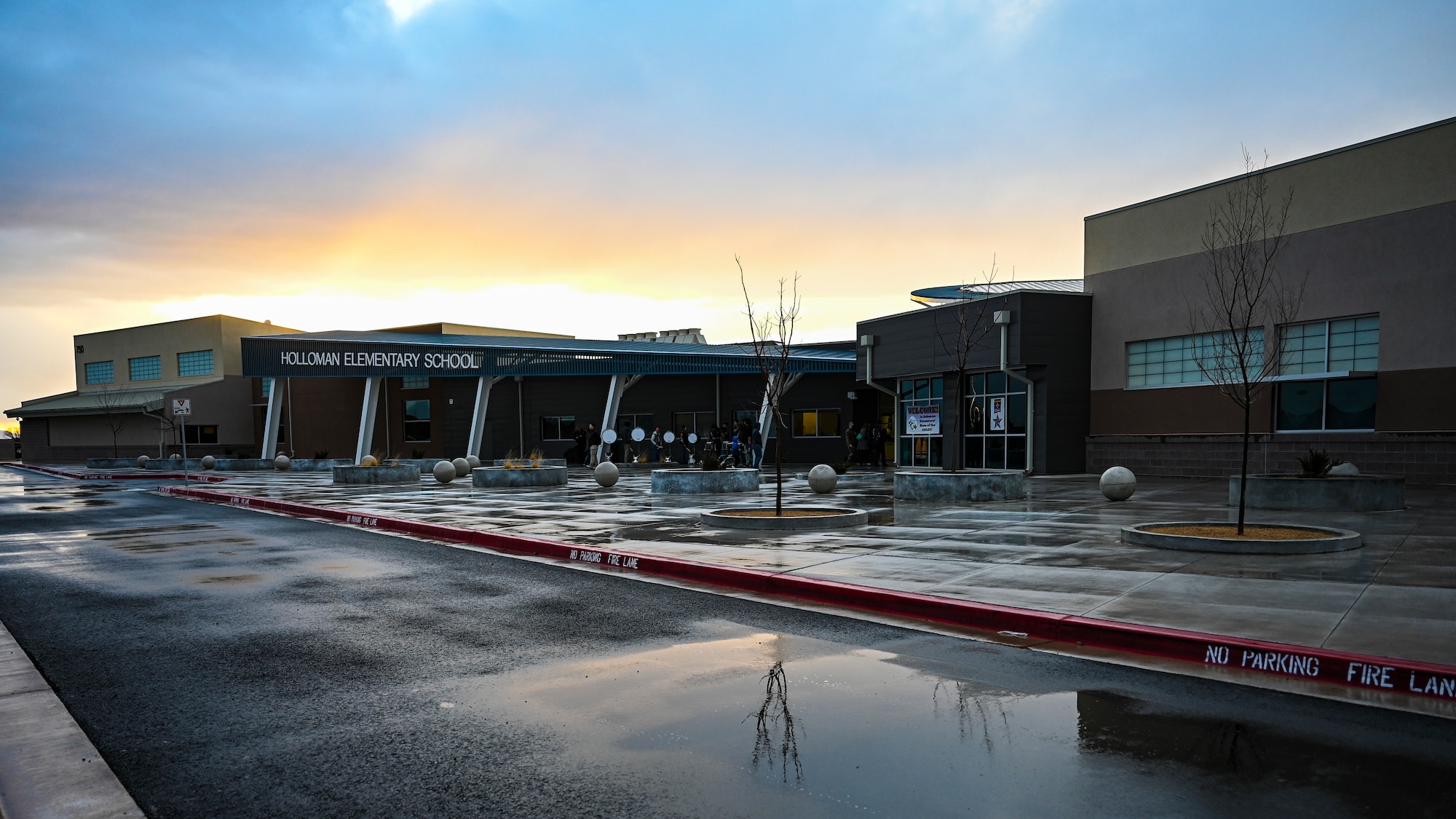 The completed Holloman Elementary School in New Mexico, Jan. 17, 2023. The new 72,154-square foot facility was designed to include structures that resemble an air traffic control tower, F-16 Viper contrail, and the roof will resemble aircraft wings. The design of the school is to honor the men and women in service. (U.S. Air Force photo by Airman 1st Class Isaiah Pedrazzini)