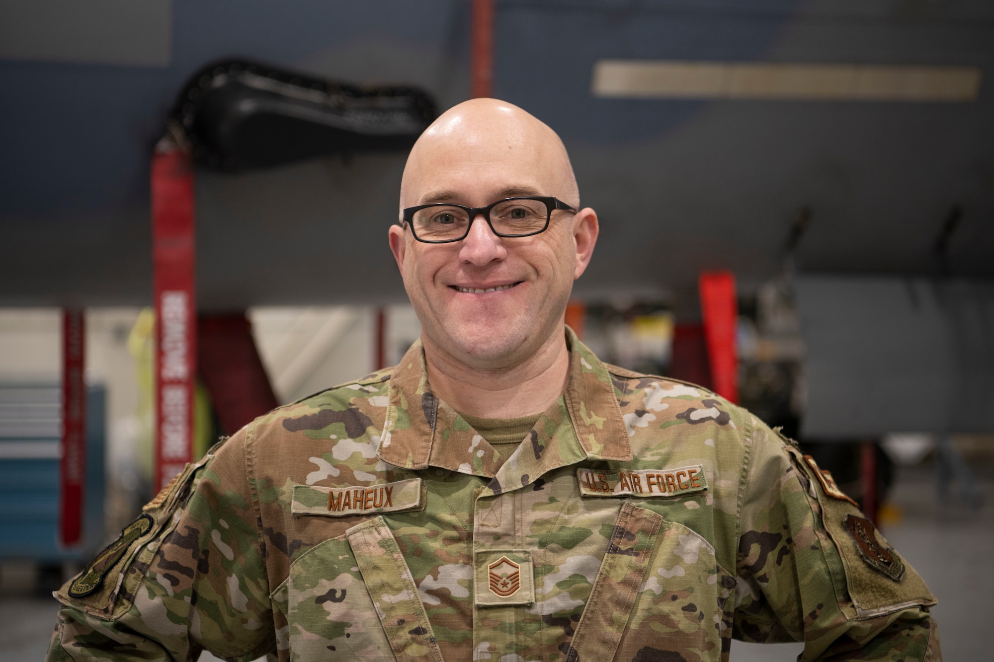 Master Sgt. Seth Maheux, 104th Armament Flight non-commissioned officer in charge, stands for a photo in front of an F-15C Eagle, Jan. 19, 2023, at Barnes Air National Guard Base, Massachusetts. Maheux is the recipient of the 2022 Air National Guard Lt. Gen. Leo Marquez Award for maintenance excellence, as a result of being one of the best in his career field. (U.S. Air National Guard Photo by Senior Airman Camille Lienau)