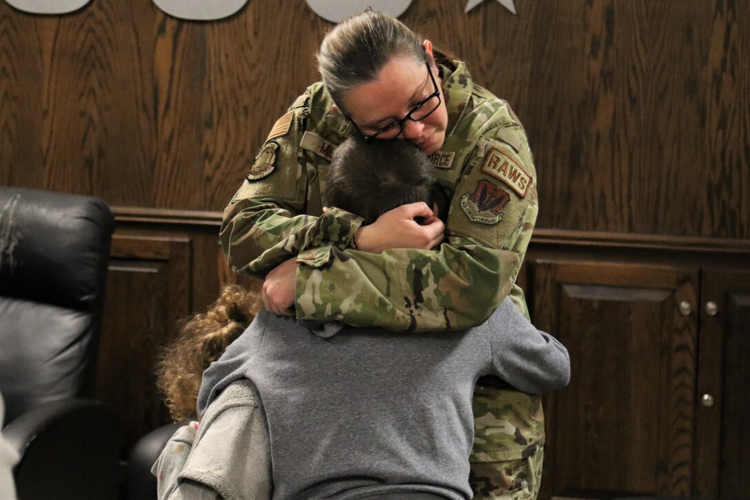 U.S. Airmen with the 211th Engineering Installation Squadron, 193rd Regional Support Group, 193rd Special Operations Wing spend time with and say goodbye to their loved ones during a farewell breakfast at the Liberty USO at Fort Indiantown Gap, Pa., Jan. 20, 2023, before leaving for deployment. The Airmen will serve in the U.S. Central Command area of operations for approximately six months.