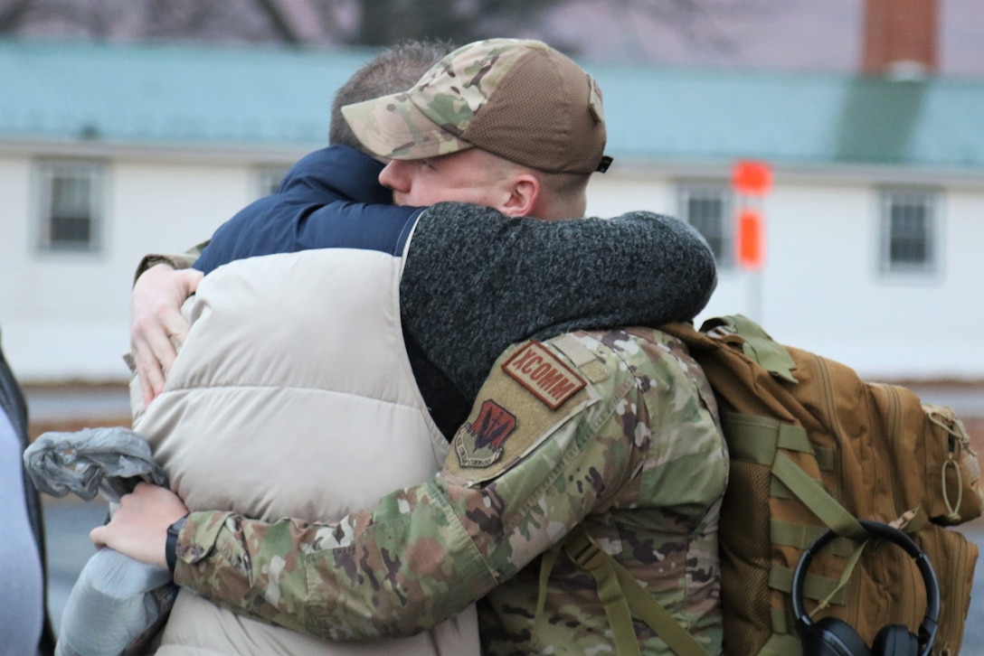 U.S. Airmen with the 211th Engineering Installation Squadron, 193rd Regional Support Group, 193rd Special Operations Wing spend time with and say goodbye to their loved ones during a farewell breakfast at the Liberty USO at Fort Indiantown Gap, Pa., Jan. 20, 2023, before leaving for deployment. The Airmen will serve in the U.S. Central Command area of operations for approximately six months.