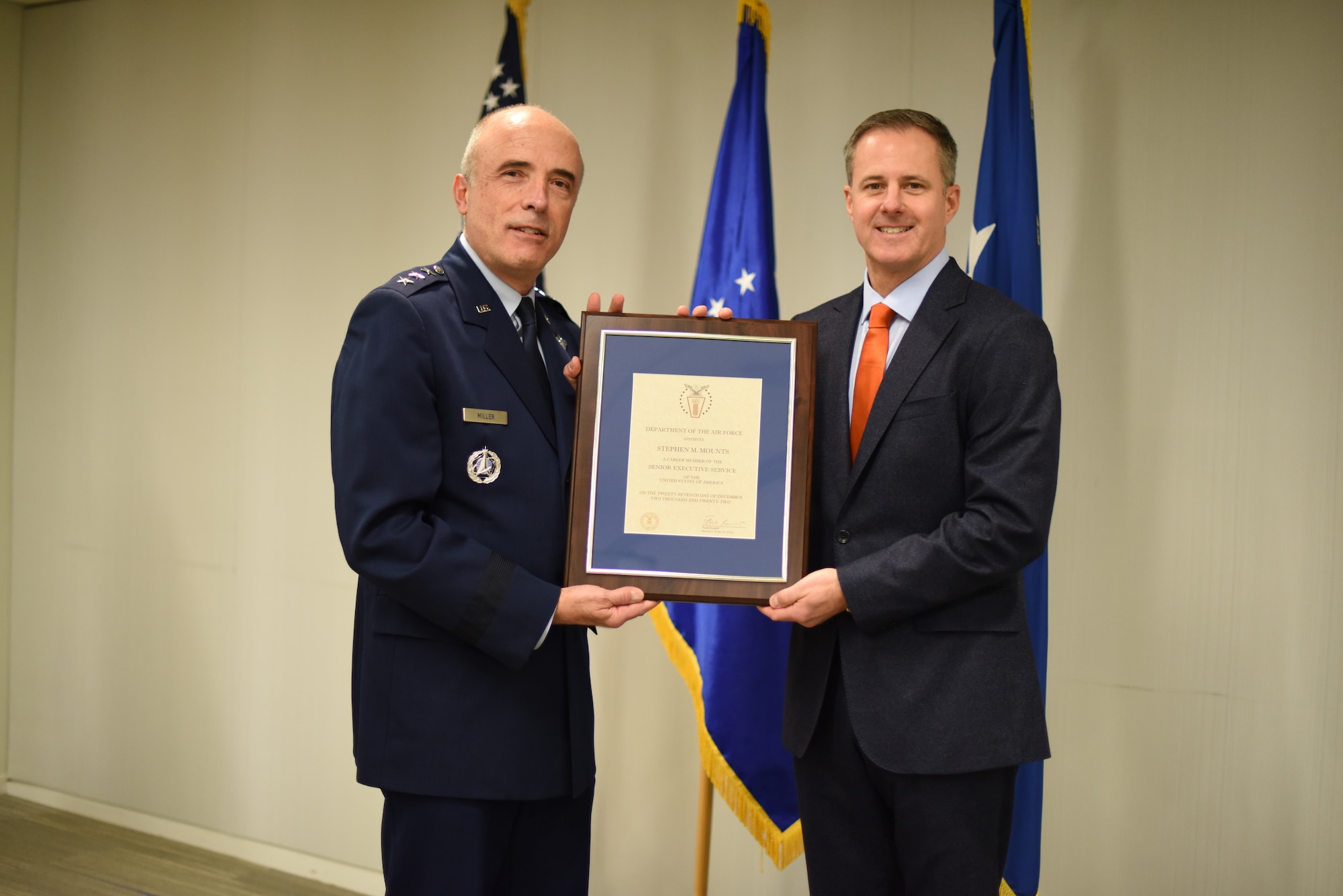 Image of an Airman honoring a civilian.