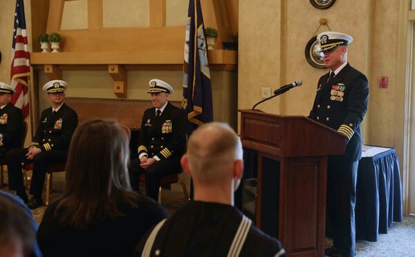 Capt. Jason Pittman, commodore, Submarine Squadron Six, delivers remarks during a change of command ceremony for the Virginia-class fast-attack submarine USS New Hampshire (SSN 778) onboard Naval Support Activity Hampton Roads, Jan. 20.