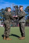 U.S. Marine Corps Lt. Col. Robert D. Barbaree III, left, commanding officer of Headquarters and Headquarters Squadron (H&HS), Marine Corps Air Station (MCAS) New River, awards the Bronze Star Medal to Master Sgt. Kevin Haunschild, right, a senior air traffic controller with H&HS, on MCAS New River in Jacksonville, North Carolina, Jan. 20, 2023. Haunschild received the Bronze Star medal for his actions as Marine Air Traffic Control Mobile Team Leader with Marine Medium Tiltrotor Squadron-162 during Operation Freedom’s Sentinel. (U.S. Marine Corps photo by Cpl. Antonino Mazzamuto)