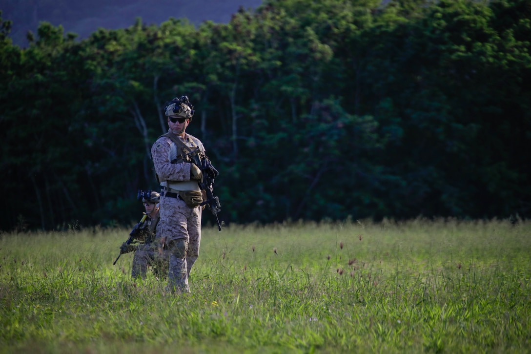 U.S. Marines with the 31st Marine Expeditionary Unit’s Maritime Raid Force, perform a Realistic Urban Training Exercise rehearsal, on Marine Corps Training Area Bellows, Jan. 7, 2023. The purpose of RUTEX is to incorporate the specialized individual and small unit skills of the MEU and conduct high-intensity, advanced, and complex Marine Air Ground Task Force operations in order to prepare MEUs and other designated forces to support the geographic combatant commanders. (U.S. Marine Corps photo by Lance Cpl Cody Purcell)