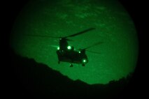 A Hawaii National Guard CH-47 arrives at Kualoa Ranch during a simulated limited scale raid, part of Realistic Urban Training Exercise 23.1, Hawaii, Jan. 18, 2023. The purpose of RUTEX is to incorporate the specialized individual and small unit skills of the Marine Expeditionary Unit and conduct high-intensity, advanced, and complex Marine Air Ground Task Force operations in order to prepare MEUs and other designated forces to support the geographic combatant commanders. (U.S. Marine Corps photo by Lance Cpl. Clayton Baker)