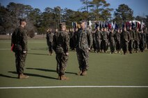 U.S. Marine Corps Sgt. Maj. Kyle R. Dubois, left, sergeant major, and Lt. Col. Robert D. Barbaree III, center, commanding officer, both with Headquarters and Headquarters Squadron (H&HS), Marine Corps Air Station (MCAS) New River, award the Bronze Star Medal to Master Sgt. Kevin Haunschild, right, a senior air traffic controller with H&HS, MCAS New River, on MCAS New River in Jacksonville, North Carolina, Jan. 20, 2023. Haunschild received the Bronze Star medal for his actions as Marine Air Traffic Control Mobile Team Leader with Marine Medium Tiltrotor Squadron-162 during Operation Freedom’s Sentinel. (U.S. Marine Corps photo by Cpl. Antonino Mazzamuto)