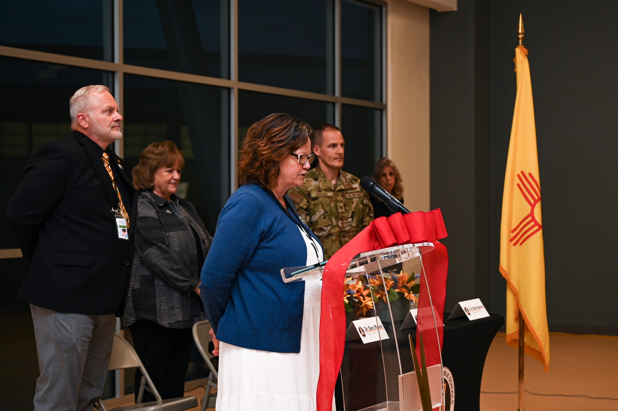 Pamela Renteria, Alamogordo Public Schools deputy superintendent, gives opening remarks to the Holloman Elementary School Ribbon Cutting and Open House at Holloman Air Force Base, New Mexico, Jan. 17, 2023. The school hosts a mixture of students from both civilian and military families. (U.S. Air Force photo by Airman 1st Class Isaiah Pedrazzini)