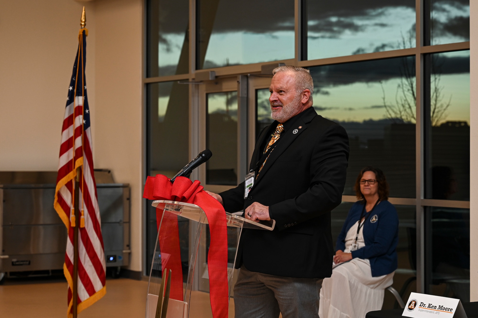 Dr. Ken Moore, Alamogordo Public Schools superintendent, speaks during the Holloman Elementary School Ribbon Cutting and Open House at Holloman Air Force Base, New Mexico, Jan. 17, 2023. Components of the new school include flexible spaces to accommodate more diversified learning activities, infrastructure to incorporate new technology, and new security measures. (U.S. Air Force photo by Airman 1st Class Isaiah Pedrazzini)