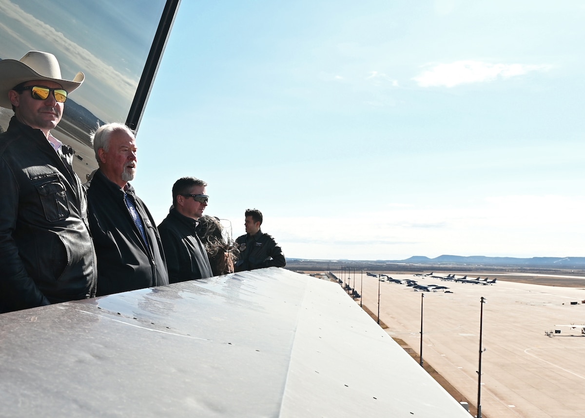 The 17th Training Wing Honorary Commanders view the flightline, Dyess Air Force Base air traffic control tower, Texas, Jan. 20, 2023. Dyess is home to the  C-130J, B-1B, and T-38 aircraft delivering global support anywhere on the globe in 12 hours or less. (U.S. Air Force photo by Airman 1st Class Zachary Heimbuch)