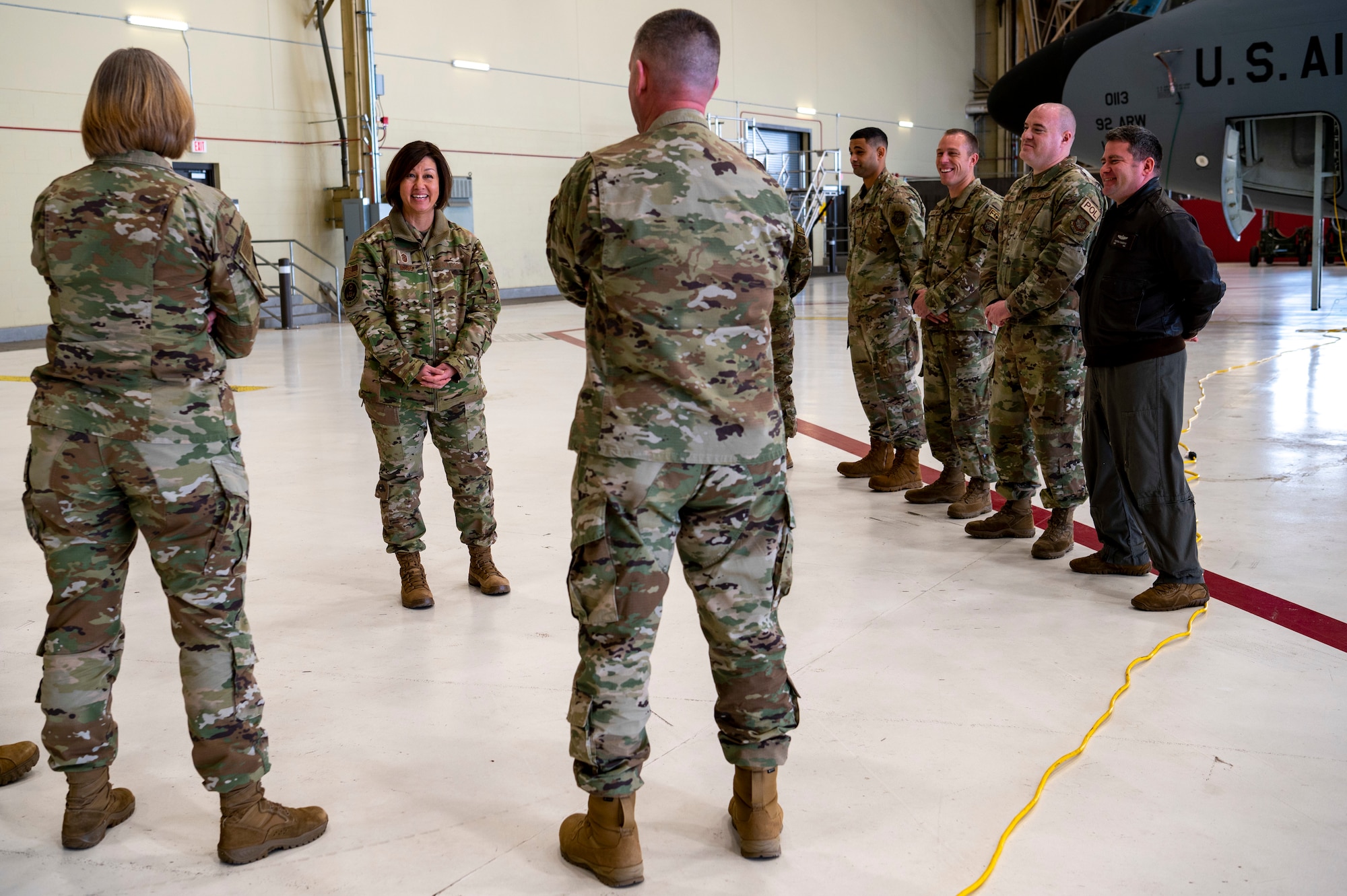 Chief Master Sergeant of the Air Force JoAnne S. Bass receives a brief about Fairchilds latest accomplishments involving agile combat employment and multi capable Airmen initiatives at Fairchild Air Force Base, Washington, Jan. 19, 2023. Chief Bass met with members assigned to Team Fairchild to discuss her mission, vision, and priorities during her visit to the base. (U.S. Air Force photo by Airman 1st Class Stassney Davis)