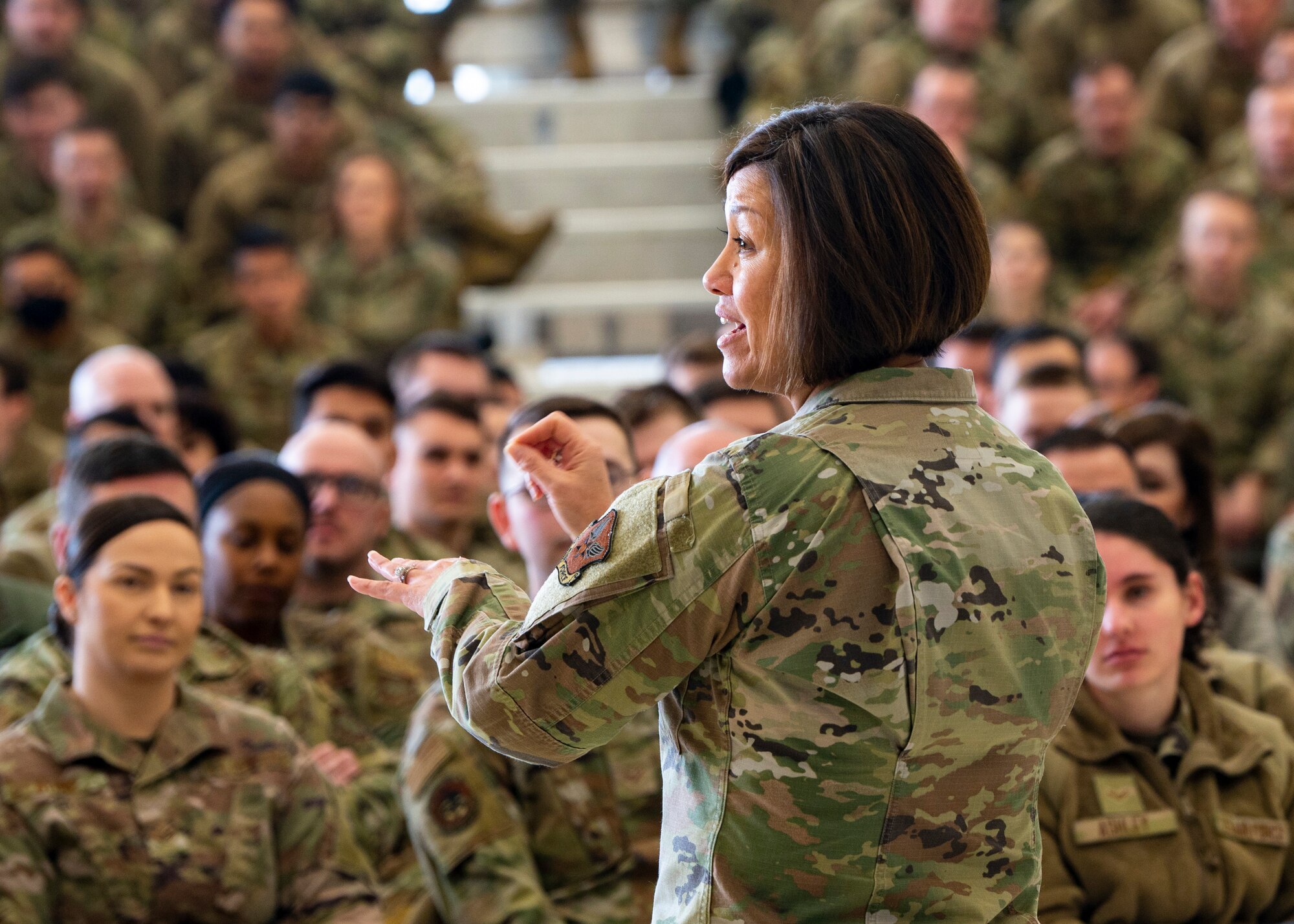 Chief Master Sergeant of the Air Force JoAnne S. Bass speaks about her priorities to Fairchild Airmen during an all call at Fairchild Air Force Base, Washington, Jan. 19, 2023.  Bass spoke about her key priorities of people, readiness, and culture, recognized outstanding performers.  (U.S. Air Force photo by Airman 1st Class Stassney Davis)