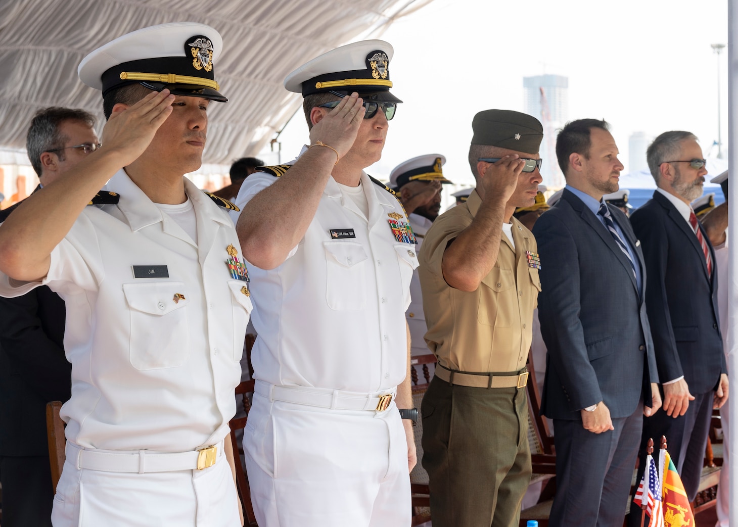 U.S. Navy Sailors assigned to amphibious transport dock USS Anchorage (LPD 23) and Lt. Col. Jared Reddinger, commanding officer of Battalion Landing Team 2/4, 13th Marine Expeditionary Unit, salute during the playing of the national anthem for Cooperation Afloat Readiness and Training/Marine Exercise Sri Lanka 2023 opening ceremony in Colombo, Jan. 19. CARAT/MAREX Sri Lanka is a bilateral exercise between Sri Lanka and the United States designed to promote regional security cooperation, practice humanitarian assistance and disaster relief, and strengthen maritime understanding, partnerships, and interoperability. In its 28th year, the CARAT series is comprised of multinational exercises, designed to enhance U.S. and partner forces’ abilities to operate together in response to traditional and non-traditional maritime security challenges in the Indo-Pacific region.