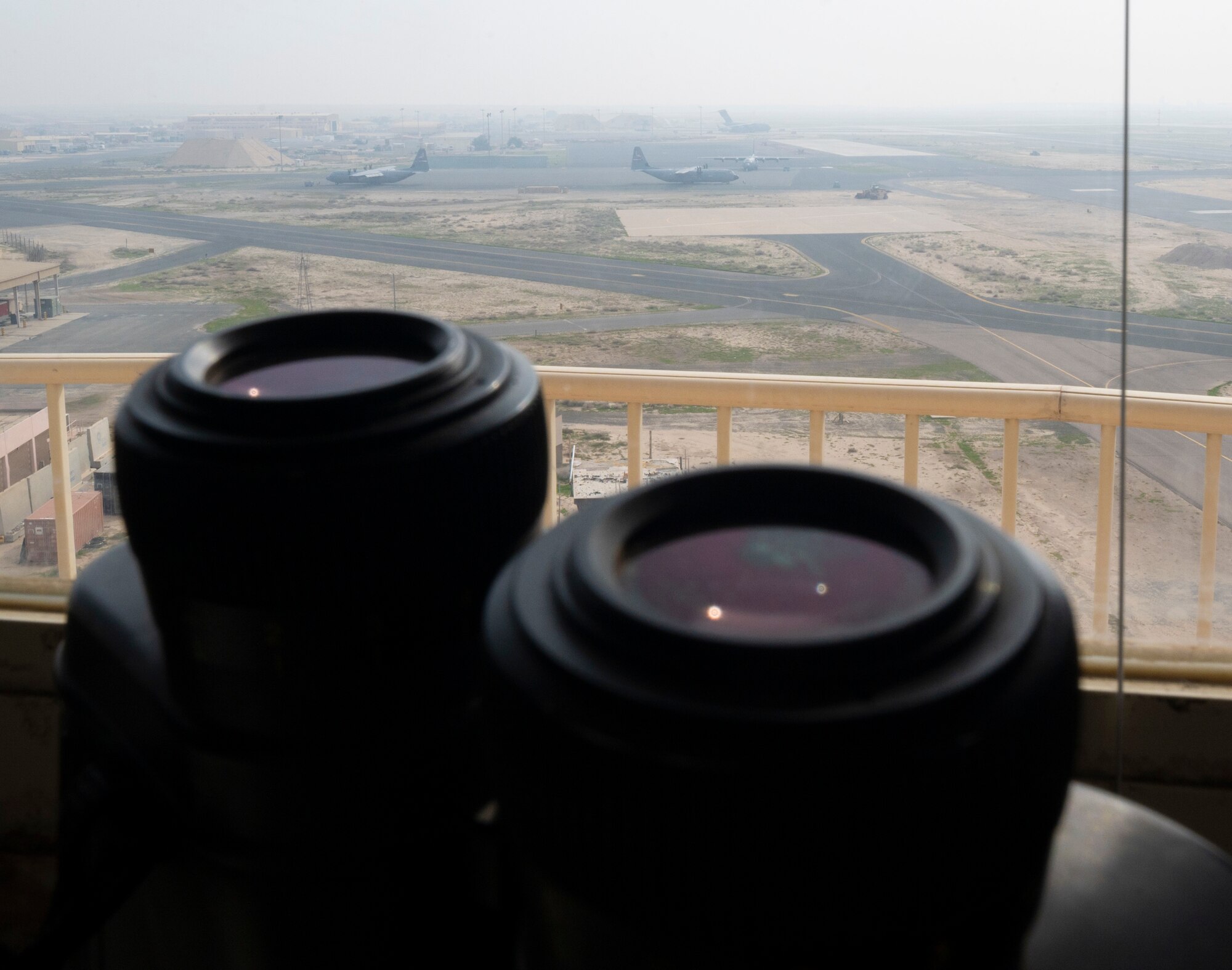 Aircraft parked on the flightline as seen from the Air Traffic Control Tower of Ali Al Salem Air Base on Jan. 16, 2023.