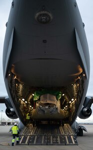 A CH-47F Chinook helicopter is unloaded from a C-17 Globemaster III assigned to Dover Air Force Base, Delaware, during a foreign military sales mission at Torrejón Air Base, Spain, Jan. 16, 2023. The helicopter was transported to Spain as a part of the Department of Defense’s FMS program. The United States and Spain are allies, strategic partners and friends. The bilateral relationship is based on deep historical ties, shared democratic values and a common vision for addressing global issues. (U.S. Air Force photo by Senior Airman Faith Barron)