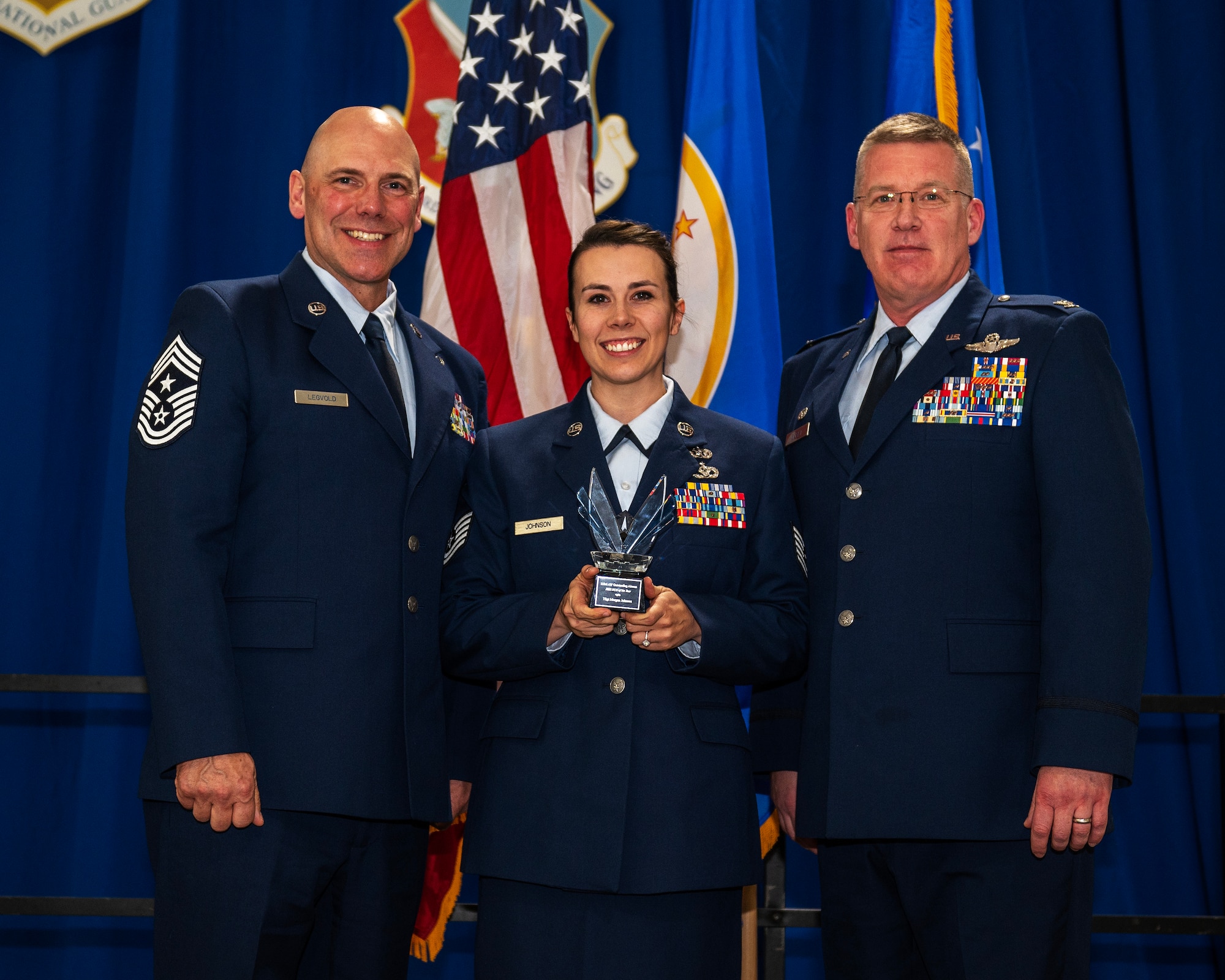 U.S. Air Force Tech. Sgt. Morgan Johnson, 133rd Mission Support Group, receives the 2022 Non-Commissioned Officer of the Year award in St. Paul, Minn., Dec. 11, 2022.