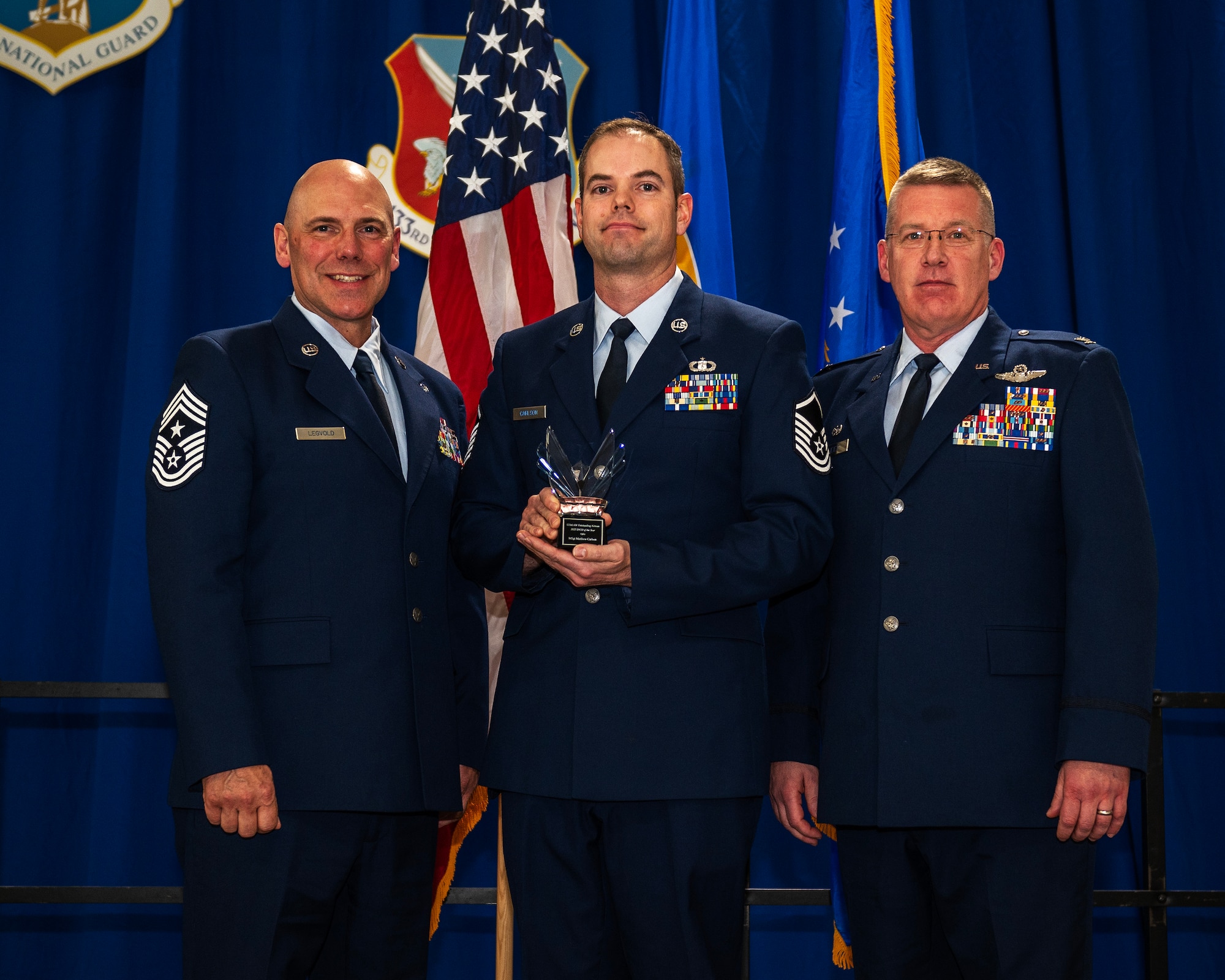 U.S. Air Force Master Sgt. Matthew Carlson, 133rd Operations Group, receives the 2022 Senior Non-Commissioned Officer of the Year award in St. Paul, Minn., Dec. 11, 2022.
