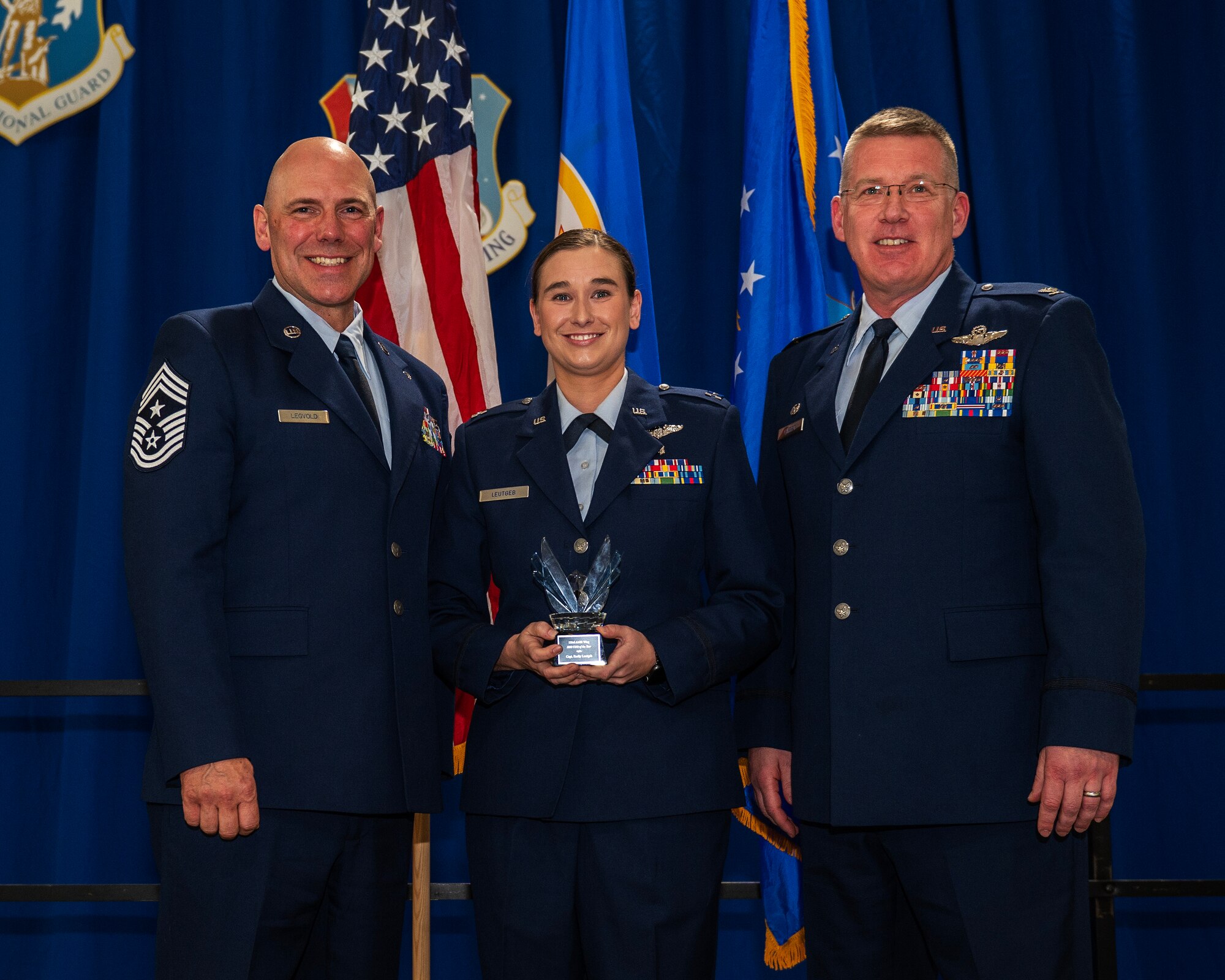 U.S. Air Force Capt. Emily Leutgeb, 133rd Operations Group, receives the 2022 Company Grade Officer of the ear award in St. Paul, Minn., Dec. 11, 2022.