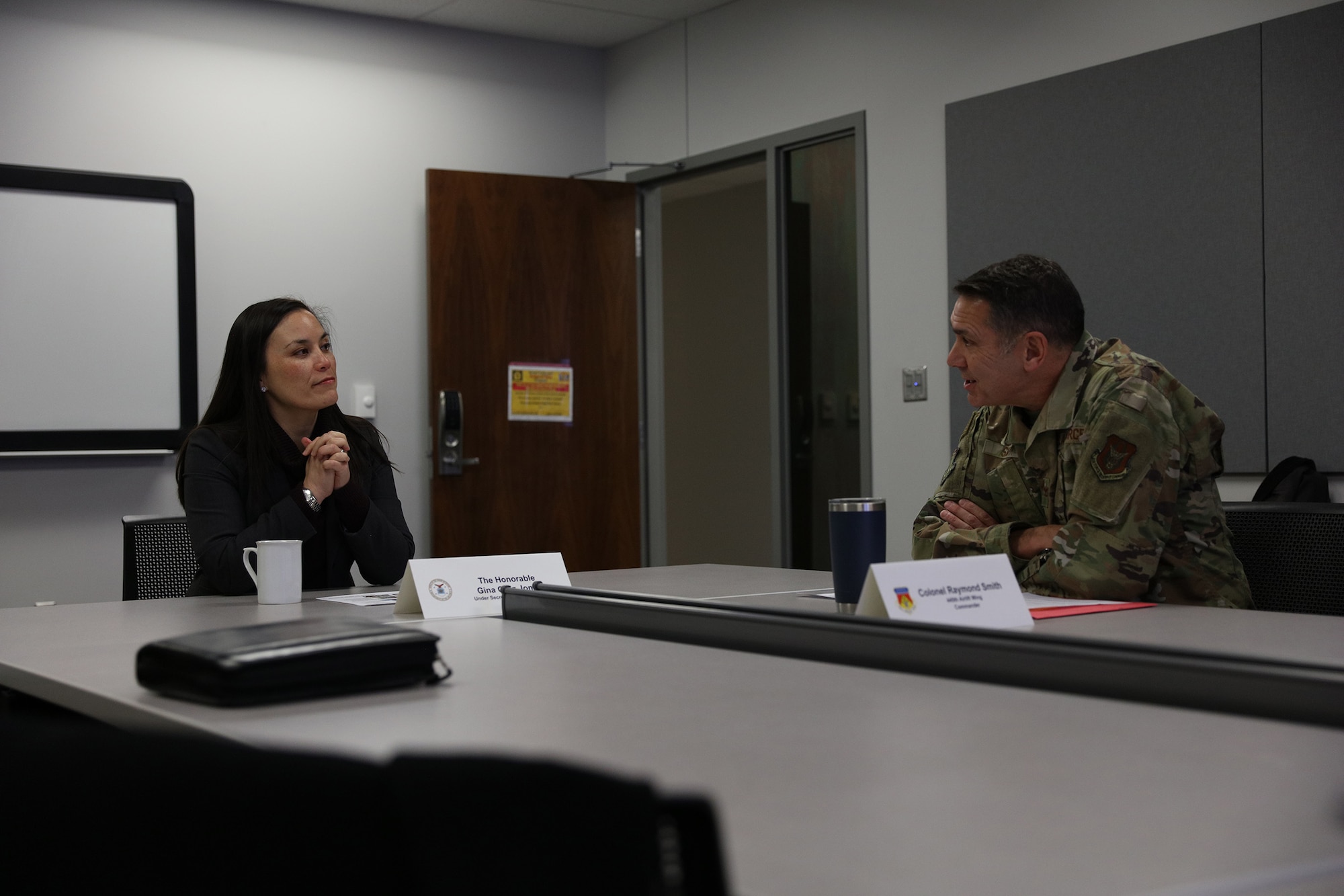 Col. Raymond A. Smith Jr., 445th Airlift Wing commander, talks about the mission of the 445th Airlift Wing to the Honorable Gina Ortiz Jones, Under Secretary of the Air Force during her visit to Wright-Patterson Air Force Base, Ohio Jan. 9, 2023.