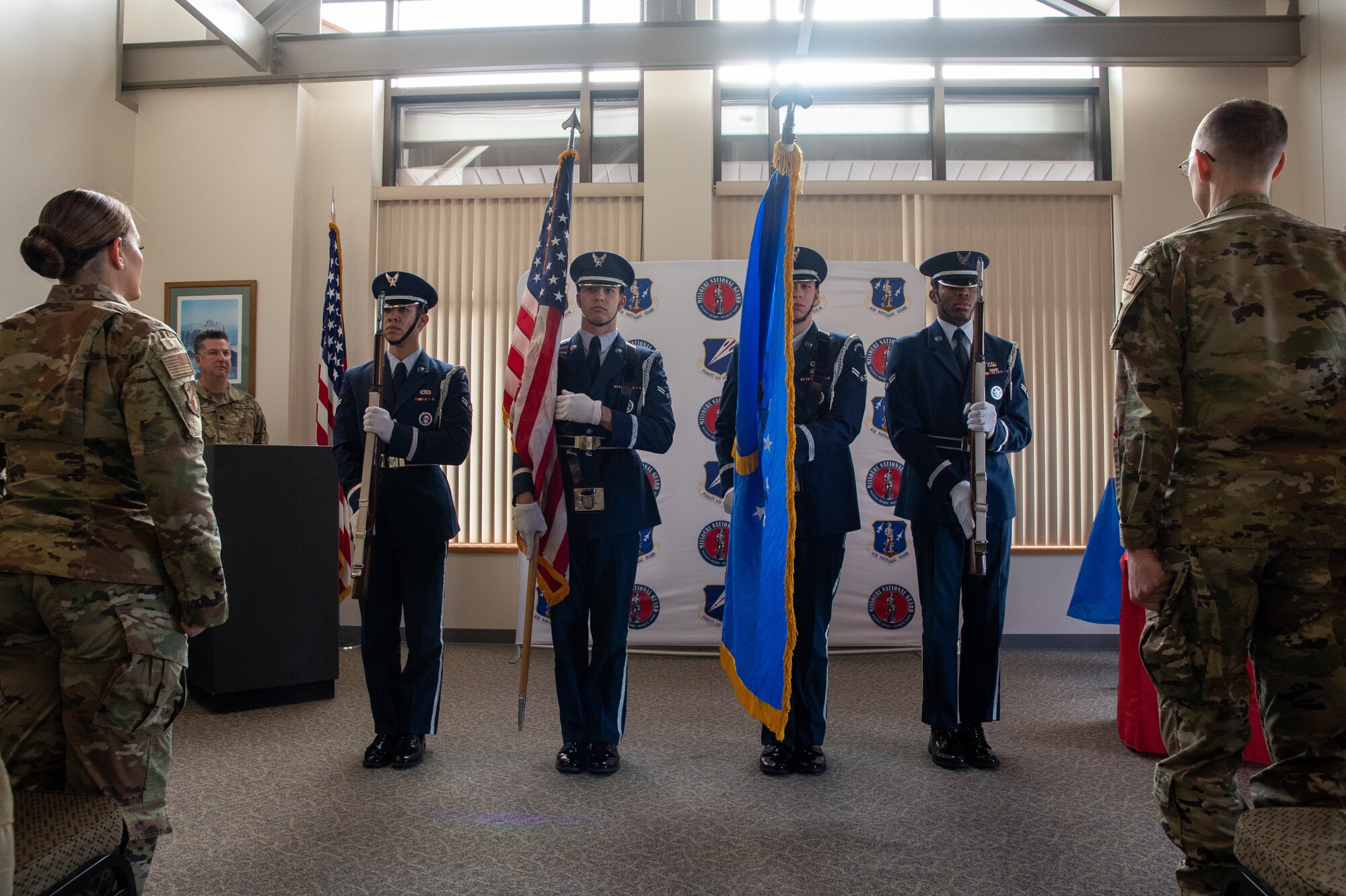 The Whiteman Air Force Base Honor Guard presents the colors during the national anthem at a senior noncommissioned officer induction ceremony at Knob Noster, Missouri, Jan. 8, 2023. Thirteen of the 131st Bomb Wing's newest master sergeants were inducted into the wing’s SNCO Corps.  (U.S. Air National Guard photo by Airman 1st Class Phoenix Lietch)