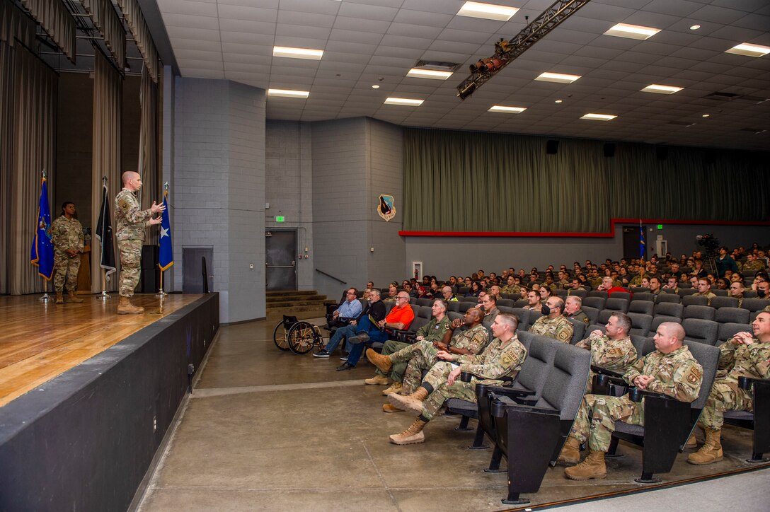 Brig. Gen. Matthew Higer, Commander, 412th Test Wing and CMSgt. Denisha Ward-Swanigan, Command Chief Master Sergeant, 412th Test Wing deliver remarks during the 412th Test Wing Townhall and All Call at Edwards Air Force Base, California, Jan. 20.