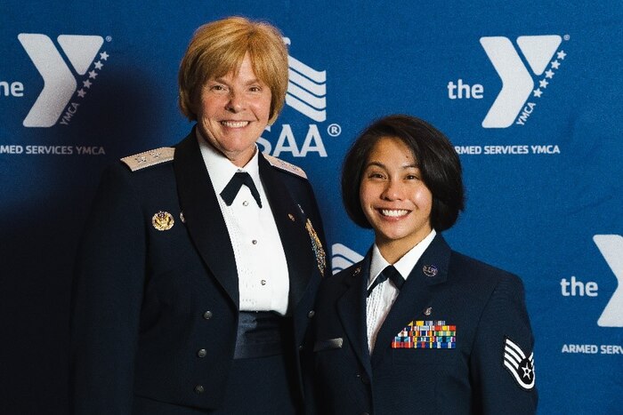 Image of two Airmen posing for a photo.