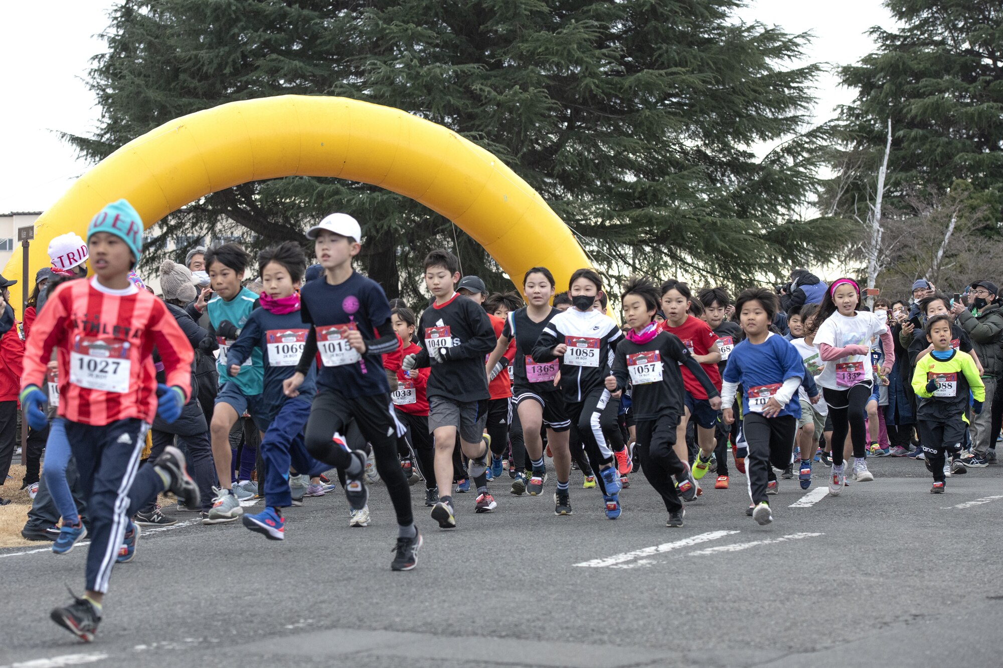 Children start a 2-km run as part of the 42nd annual Frostbite Road Race.