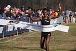 Army Sgt. Ednah Kurgat of Fort Carson, Colorado crosses the finish line to win the women's national championship during 2023 Armed Forces Cross Country Championship held in conjunction with the USA Track and Field Cross Country National Championship in Richmond, Va.  The Armed Forces Championship features teams from the Army, Marine Corps, Navy (with Coast Guard runners), and Air Force (with Space Force Runners).  Department of Defense Photo by Mr. Steven Dinote - Released.