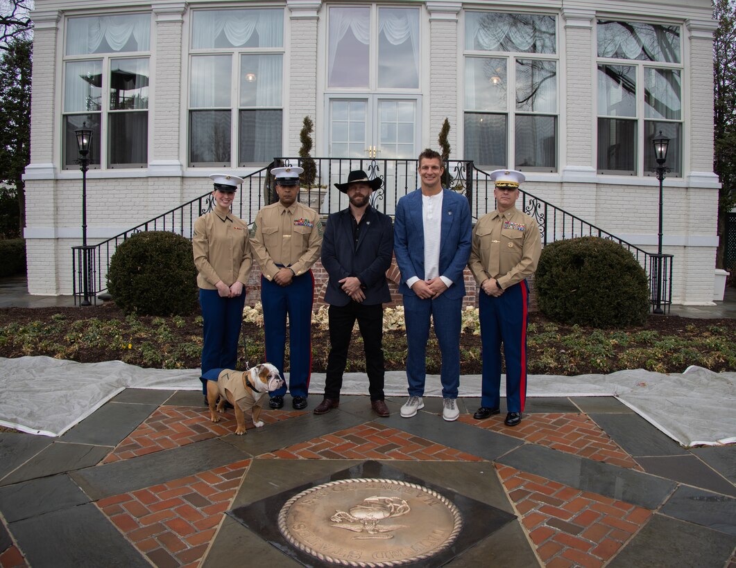 Marines with Marine Barracks Washington welcome Robert Gronkowski, retired tight-end for the Tampa Bay Buccaneers, and Donald “Cowboy” Cerrone, retired American Mixed Martial Artist, to the barracks on Jan 17, 2023. Gronkowski and Cerronewere both introduced and given a tour of the barracks by Col. Robert A. Sucher, commanding officer of Marine Barracks Washington, and Sgt Maj. Jesse E. Dorsey, Sergeant Major of Marine Barracks Washington. (Photo by Lance Cpl. Pranav Ramakrishna)