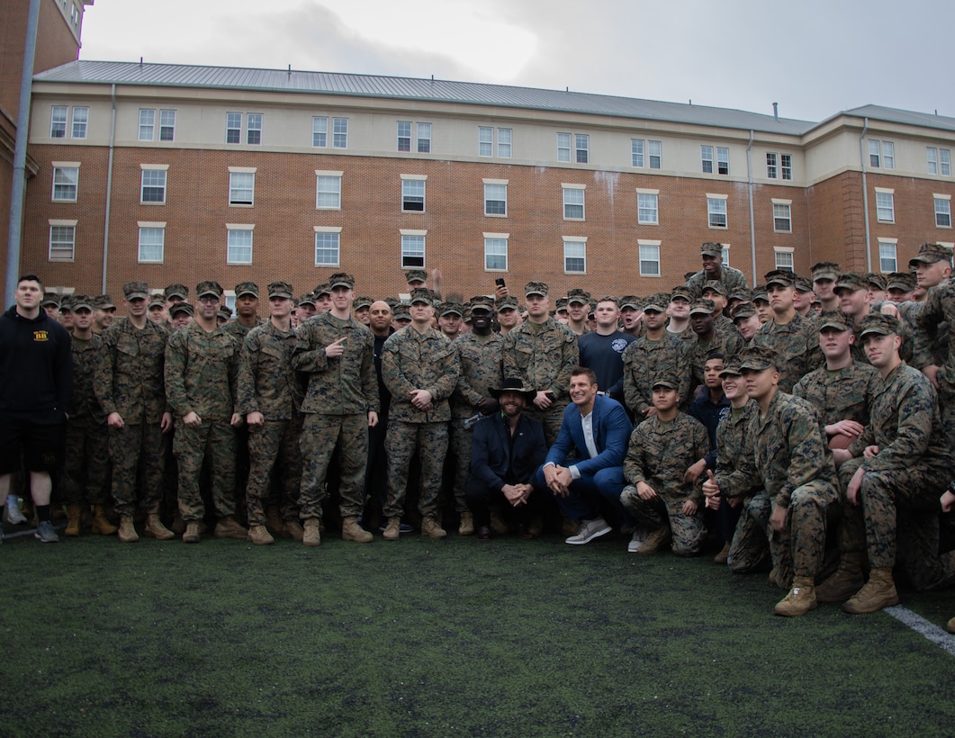 Marines with Marine Barracks Washington welcome Robert Gronkowski, retired tight-end for the Tampa Bay Buccaneers, and Donald “Cowboy” Cerrone, retired American Mixed Martial Artist, to the barracks on Jan 17, 2023. Gronkowski and Cerrone were both introduced and given a tour of the barracks by Col. Robert A. Sucher, commanding officer of Marine Barracks Washington, and Sgt Maj. Jesse E. Dorsey, Sergeant Major of Marine Barracks Washington. (Photo by Lance Cpl. Pranav Ramakrishna)