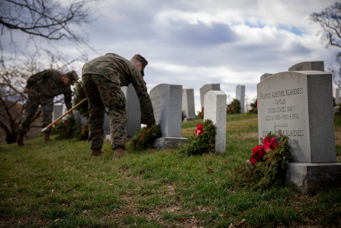 Barracks Marines clear wreaths from gravesites at Arlington National Cemetery on Jan 20, 2023. Over the weekend, Marine Barracks Washington had the solemn honor of participating in clearing wreaths from over 250,000 gravesites in remembrance and honor of our nation’s fallen service members and their families. (U.S. Marine Corps photo by Cpl. Mark Morales)