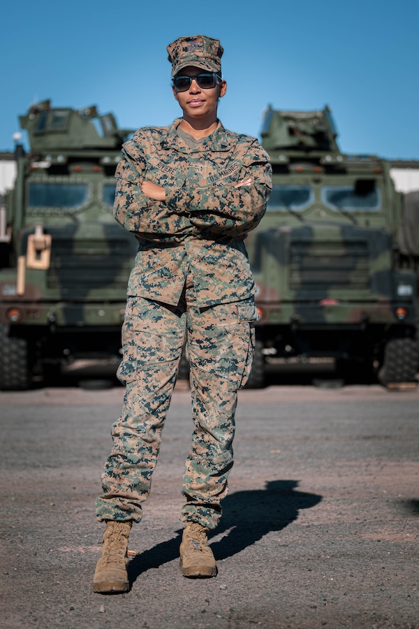 U.S. Marine Corps Cpl. Nailey Riviere, a motor transport operator with Combat Logistics Battalion 15, Combat Logistics Regiment 1, 1st Marine Logistics Group, poses for a picture at Camp Pendleton, California, Dec. 9, 2022. Riviere was born in Haiti and her goal was to be a mentor and leader for her junior Marines. (U.S. Marine Corps photo by Lance Cpl. Kristy Ordonez Maldonado)