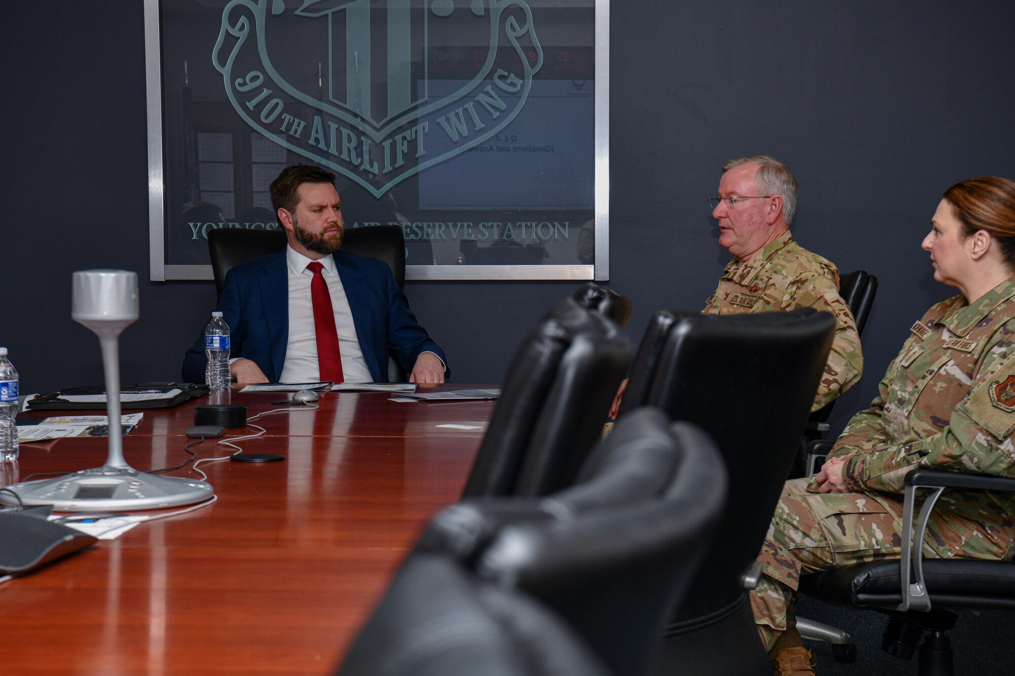 U.S. Sen. JD Vance, representing Ohio, Col. Jeff Van Dootingh, commander of the 910th Airlift Wing, and Chief Master Sgt. Jennifer McKendree, command chief of the 910th AW, talk during Vance’s visit on Jan. 17, 2023, at Youngstown Air Reserve Station, Ohio.