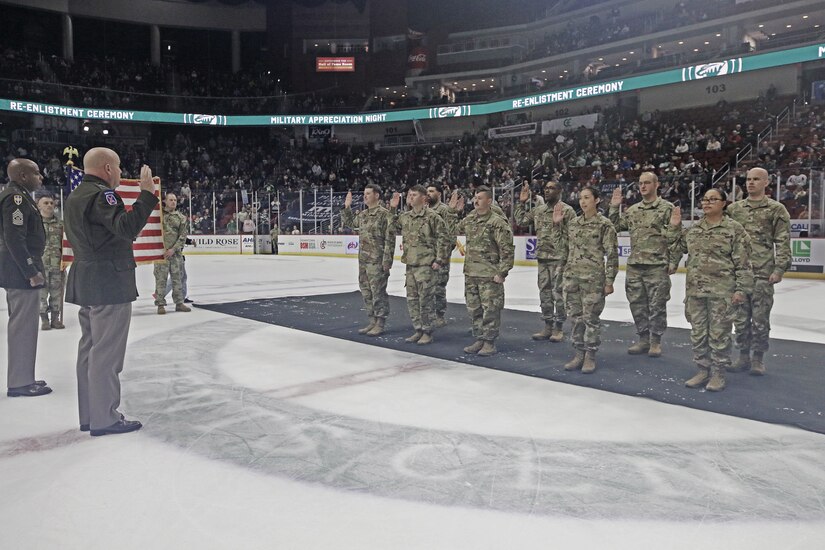 Maj. Gen. Baker re-enlists Reserve Soldiers at Iowa Wild game