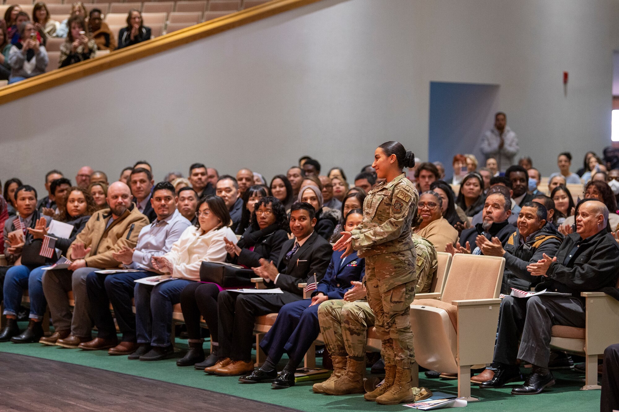 Airman Lissbeth Cardenas Idrovo, 22nd Contracting Squadron contracting specialist, is recognized at the Kansas Naturalization Ceremony Jan. 20, 2023, in Wichita, Kansas. During the ceremony individuals from 46 different countries from all over the world became U.S. citizens. (U.S. Air Force photo by Airman 1st Class Brenden Beezley)