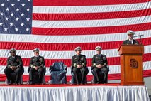Capt. Kevin Ralston, far right, addresses the crew of amphibious transport dock USS San Diego for the last time as commanding officer during a change of command ceremony held aboard the ship, Jan. 20, 2023. Capt. David Walton relieved Ralston as commanding officer of San Diego during the ceremony.