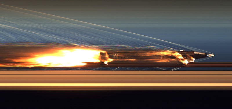 A hypersonic sled travels on a monorail and emits a shooting flame.