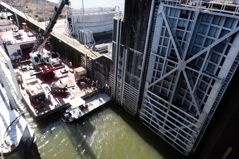 The U.S. Army Corps of Engineers Nashville District’s Maintenance Support Team onboard the Motor Vessel Iroquois repairs the needle-dam-girder beam slot Jan. 19, 2023, on the downstream side of Watts Bar Lock on the Tennessee River in Decatur, Tennessee. (USACE Photo by Lee Roberts)