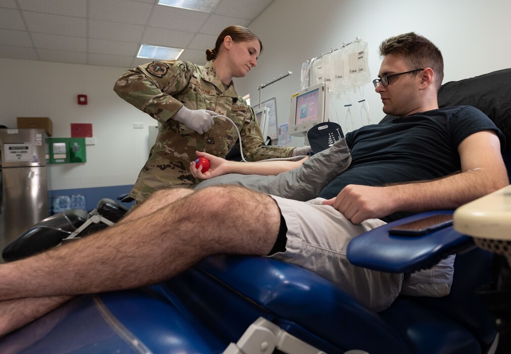 Photo of an airman donating platelets